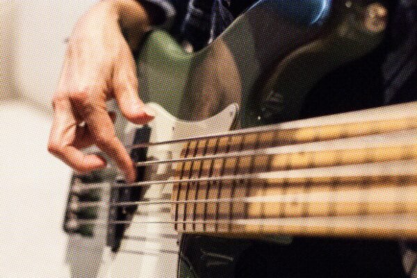 How to Play Bass with a Pick vs. Fingers